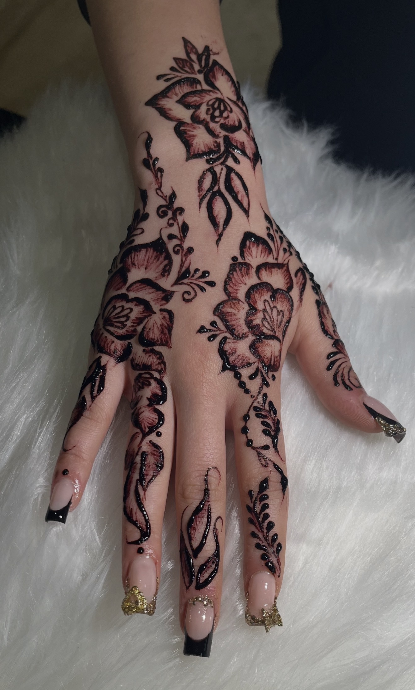 Dark floral henna